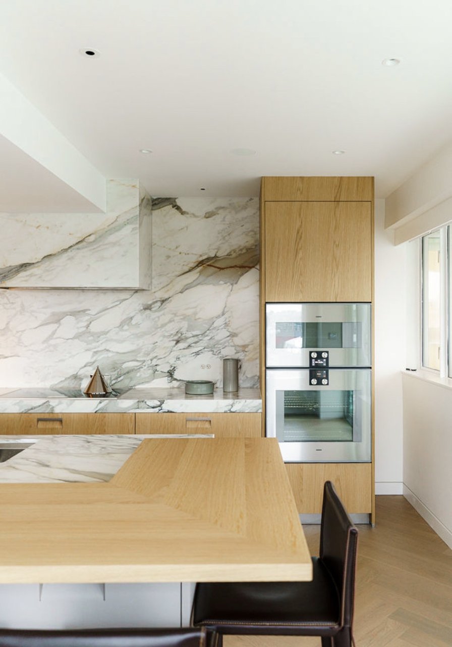 Marble kitchen with custom cabinetry renovated by Mulder Contracting in North Vancouver