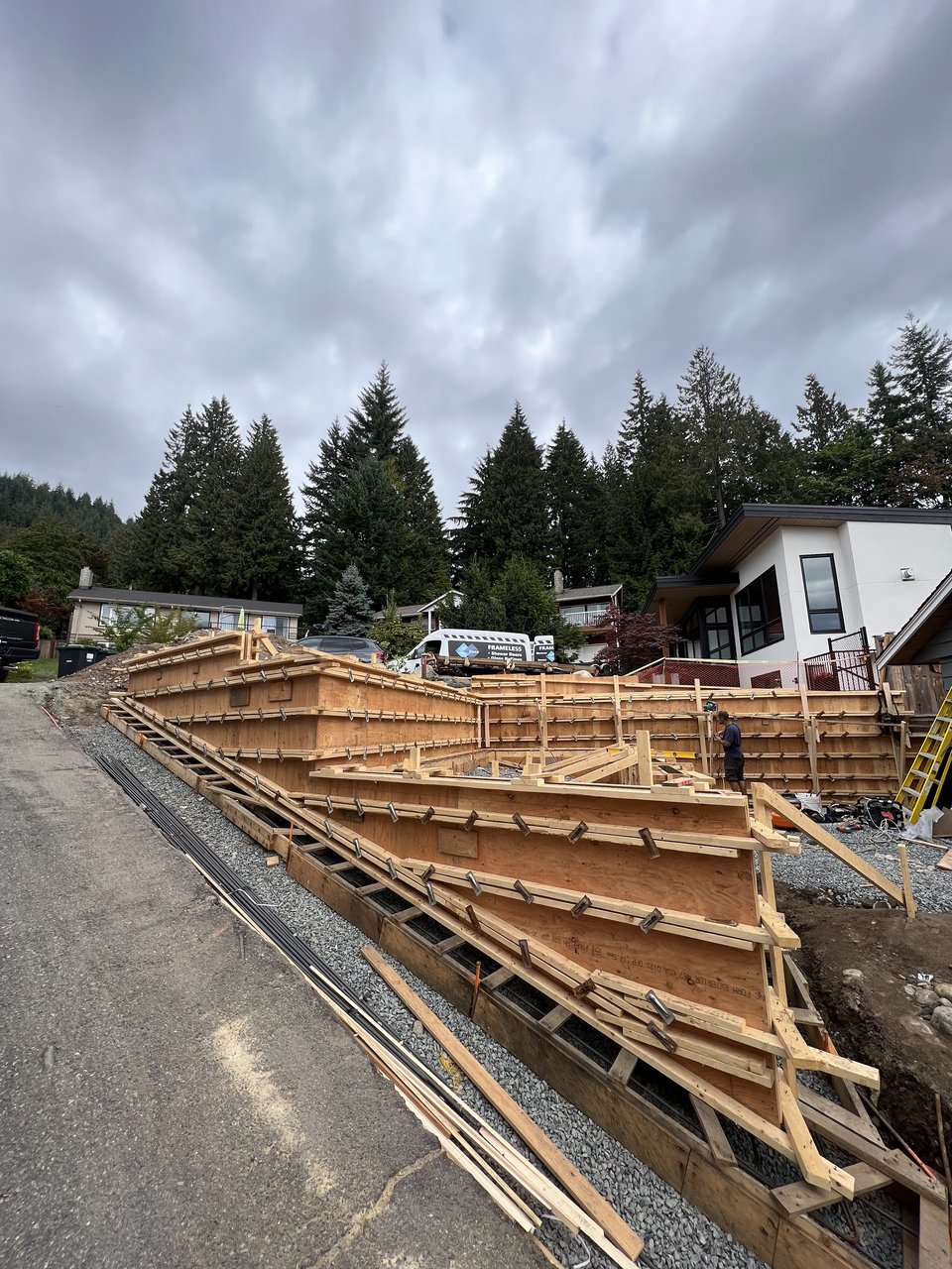 Foundation formwork and layout across a North Vancouver building site