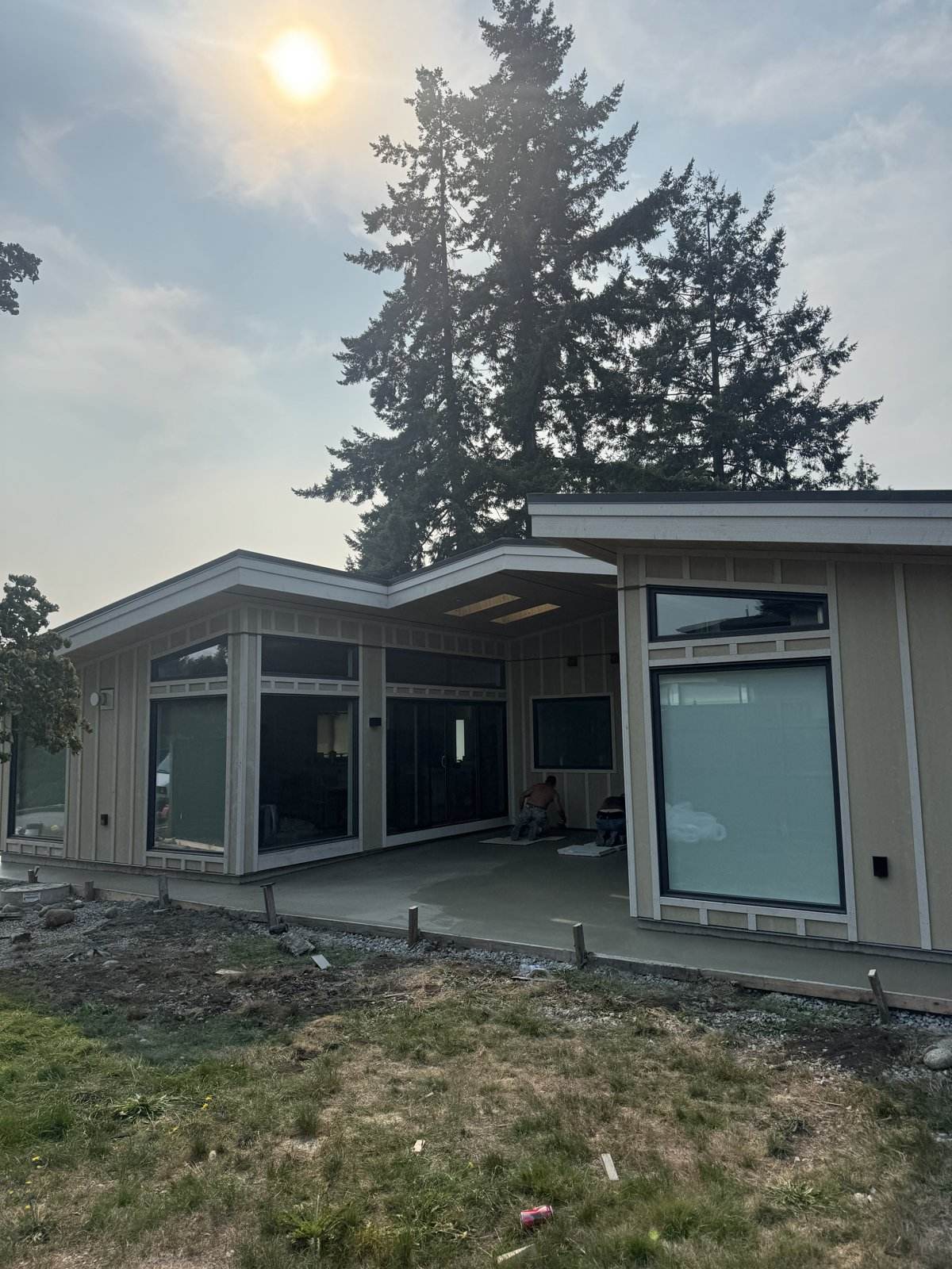 Custom home exterior with dark cladding built by Mulder Contracting, North Vancouver BC