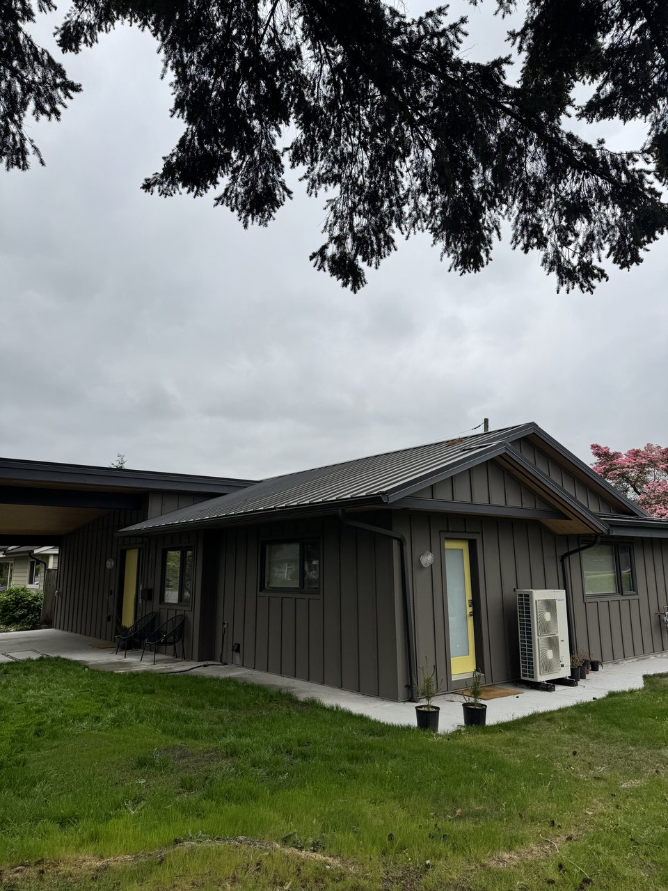 Custom home exterior cladding and roofline built by Mulder Contracting in North Vancouver