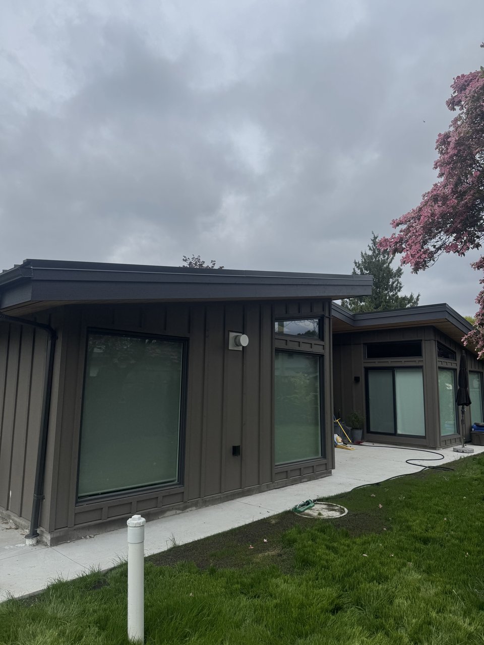Custom home exterior entry and siding detail, North Vancouver BC