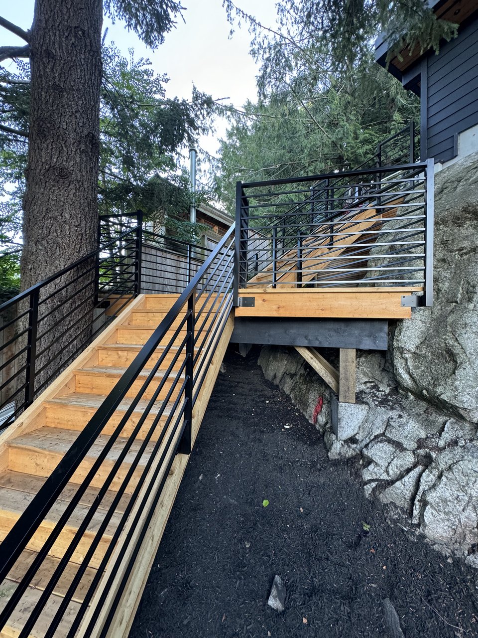 Deck framing and railing detail on a North Vancouver property