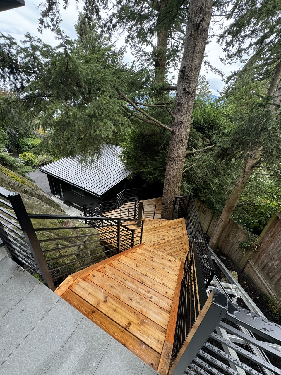 Elevated deck structure among trees in North Vancouver, BC